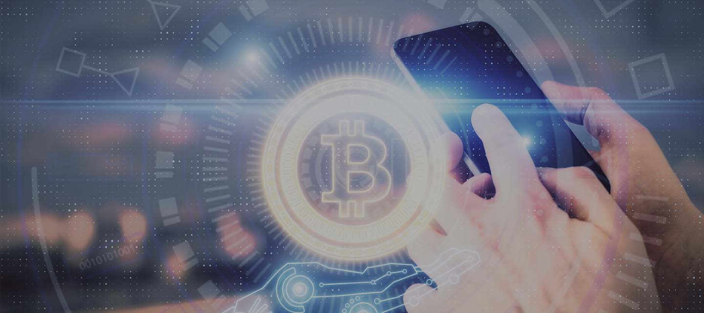 Bitcoin display over man using smartphone